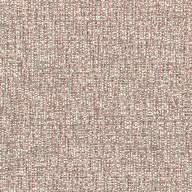 Close-up of a soft blush pink woven fabric with tiny speckled texture