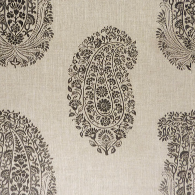 Charcoal paisley print on a pale stone fabric ground