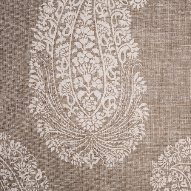 Large ivory paisley damask motif printed on a warm taupe woven ground