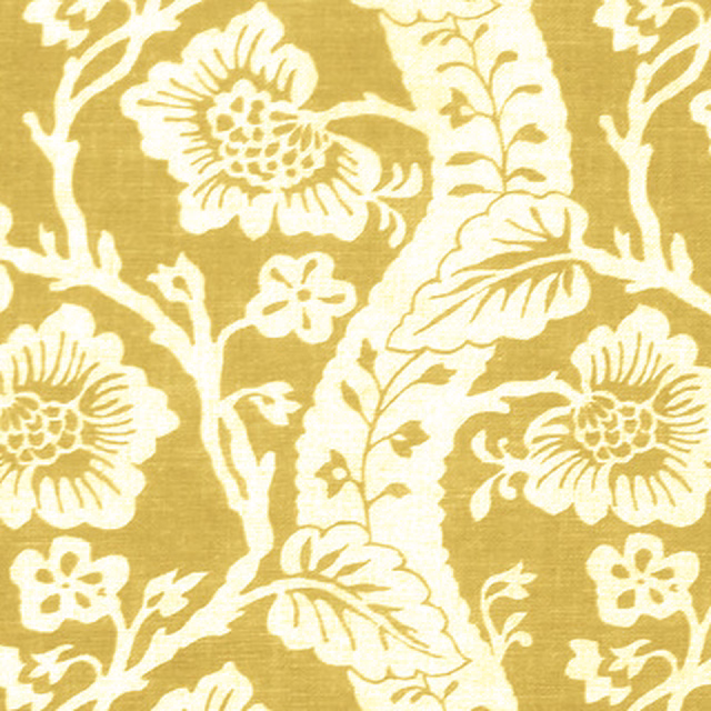 Mustard yellow floral trail fabric with ivory palampore-style flowers and leaves