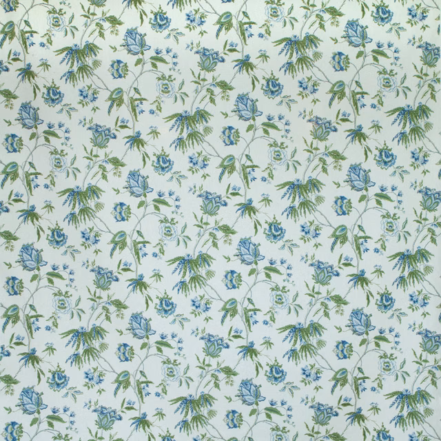Pale floral print with blue blooms and green trailing stems