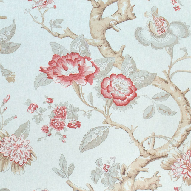 Close-up of a floral print with rose pink blooms and pale hessian branches on a light ground