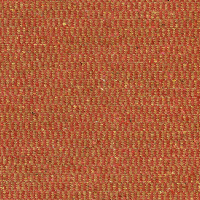 Close-up of claret red woven fabric with golden flecks and compact texture