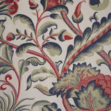 Large-scale botanical print on warm cream fabric with navy, sage and coral leaves
