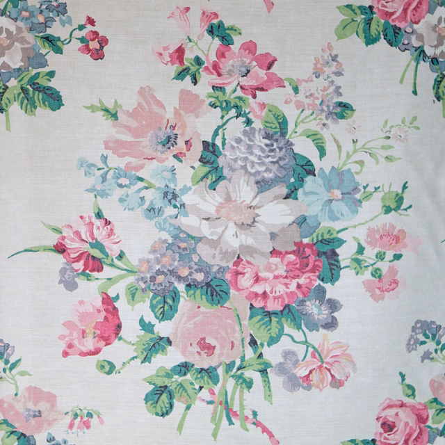 Large painterly floral fabric with berry pink, aqua, grey and green blooms on ivory