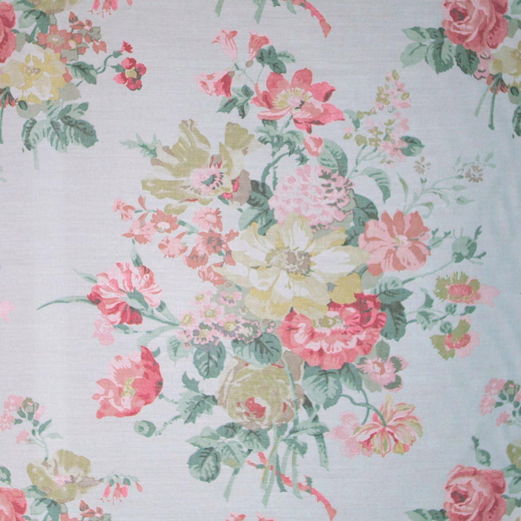 Pale ground floral fabric with pink, sage and yellow painterly bouquets