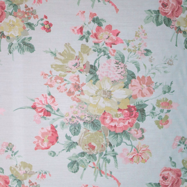 Pale ground floral fabric with pink, sage and yellow painterly bouquets
