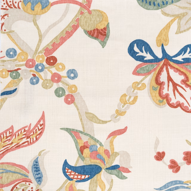Multicolour botanical print on an ivory ground with leaves, berries and scrolls