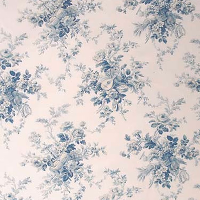 Blue turquoise toile floral print on a pale cream ground