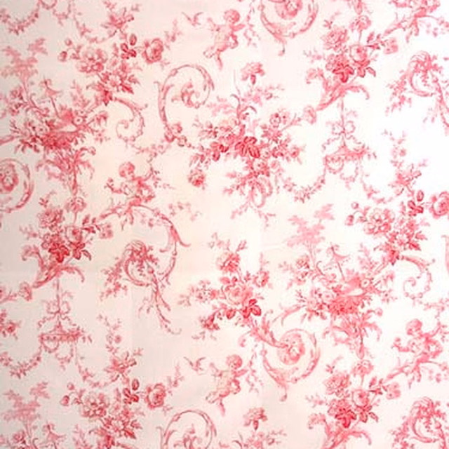 Pink toile floral fabric with scrolling vines on a pale cream ground