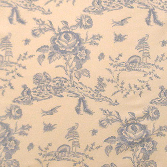 Cream toile fabric with pale blue floral and scenic pattern
