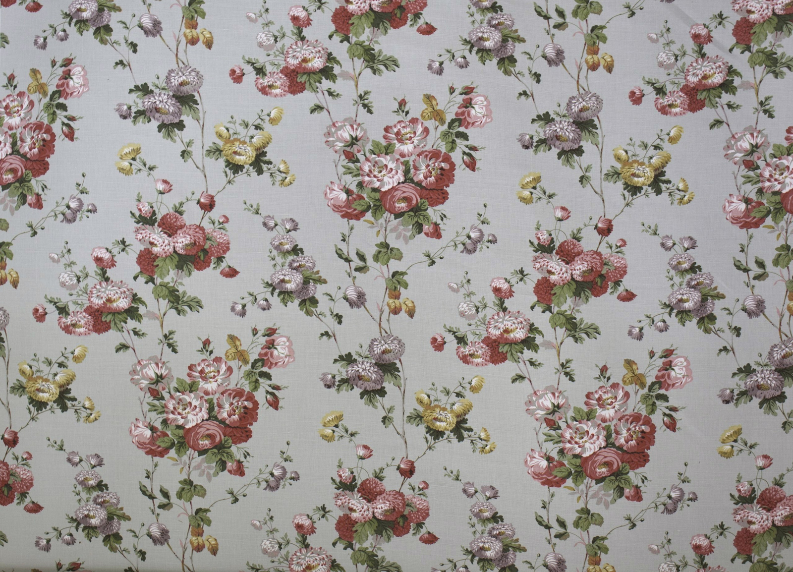 Pale grey floral fabric with scattered pink, sage and yellow bouquets