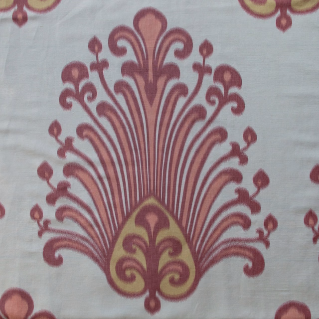 Large Carmen pink and yellow damask motif on a pale ivory fabric swatch