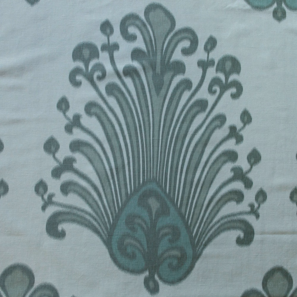 Large teal damask motif on a pale linden ground with soft printed edges