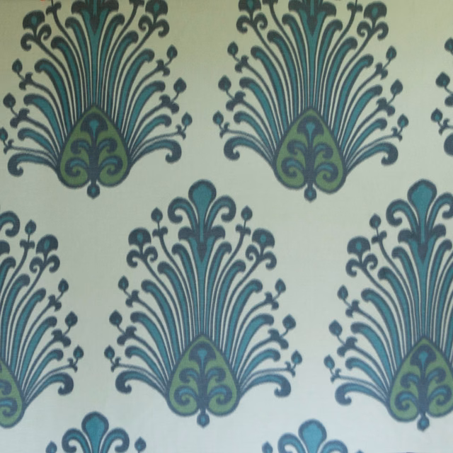 Pale lichen-green fabric with teal and sage damask fan motifs
