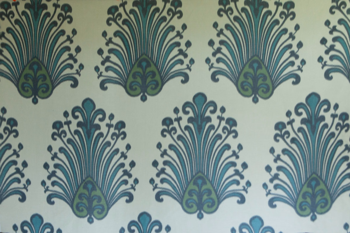 Large teal and sage damask motifs on a pale lichen ground