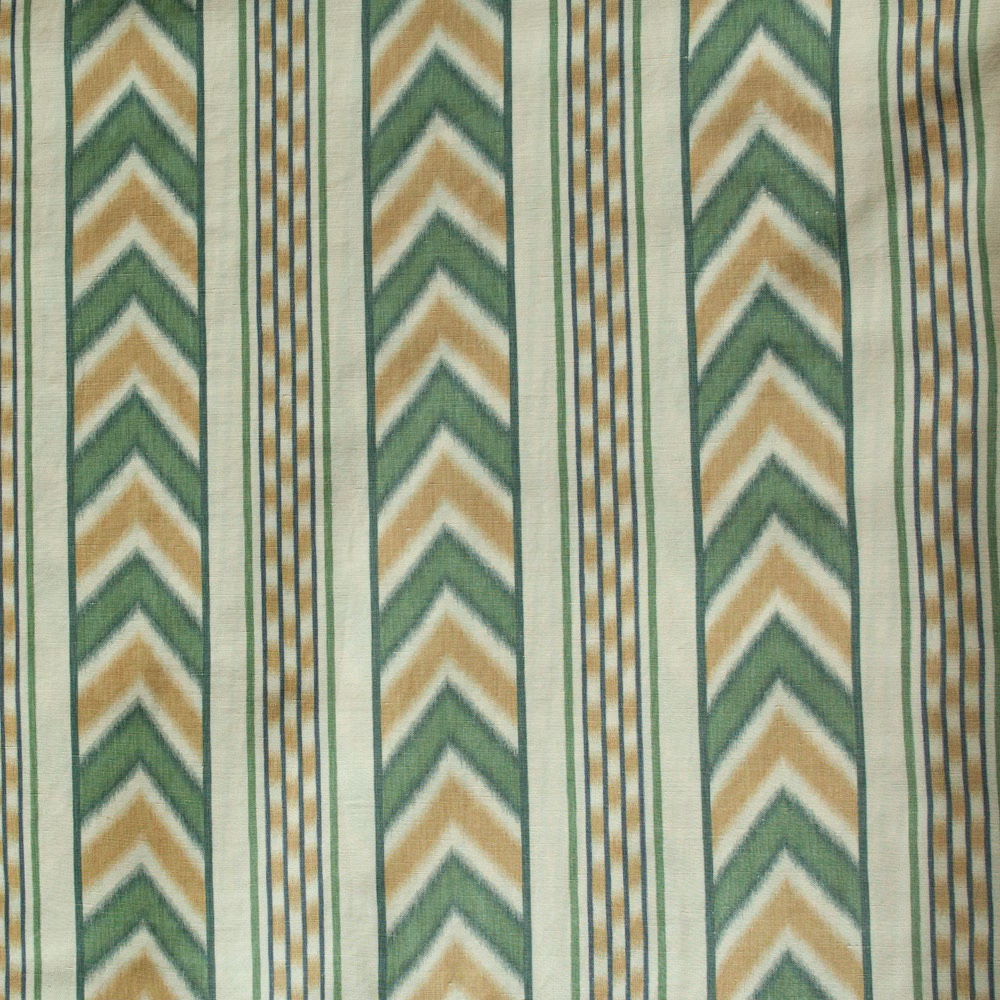 Vertical green and ochre chevron stripes on a pale woven ground