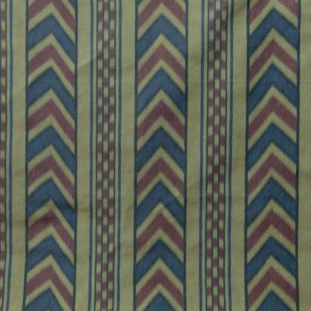 Vertical striped fabric with prussian blue chevrons and bordeaux accents on a pale ground