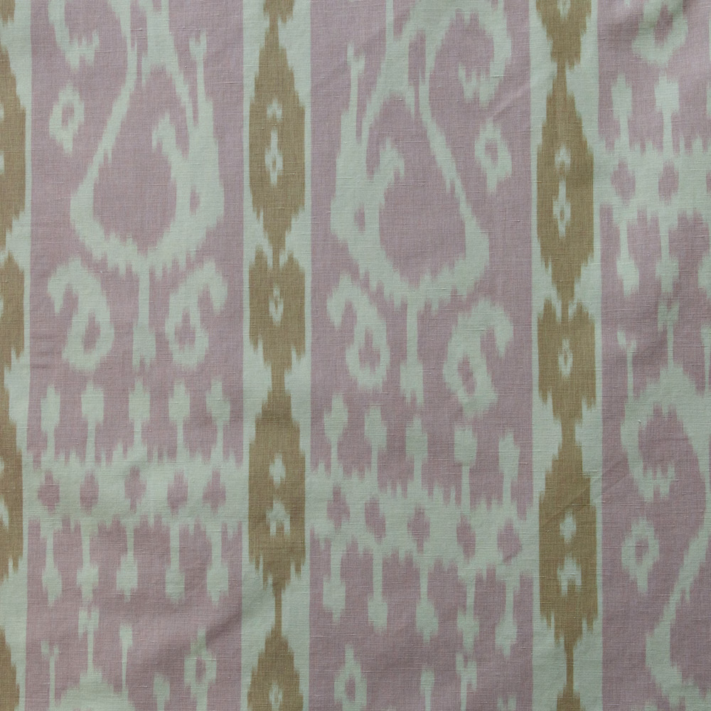 Dusty rose woven fabric with ochre vertical stripes and pale ikat paisley motifs