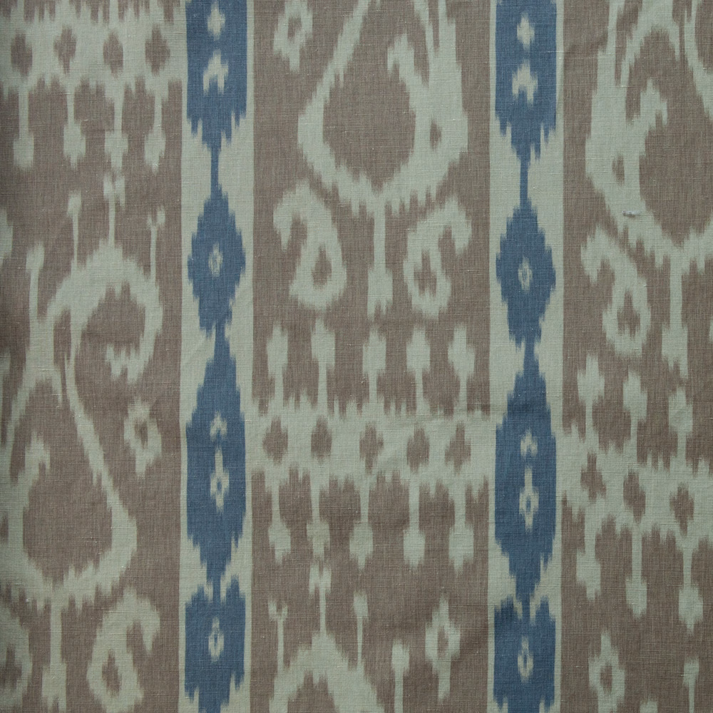 Sienna and navy woven paisley fabric with vertical ikat-style bands