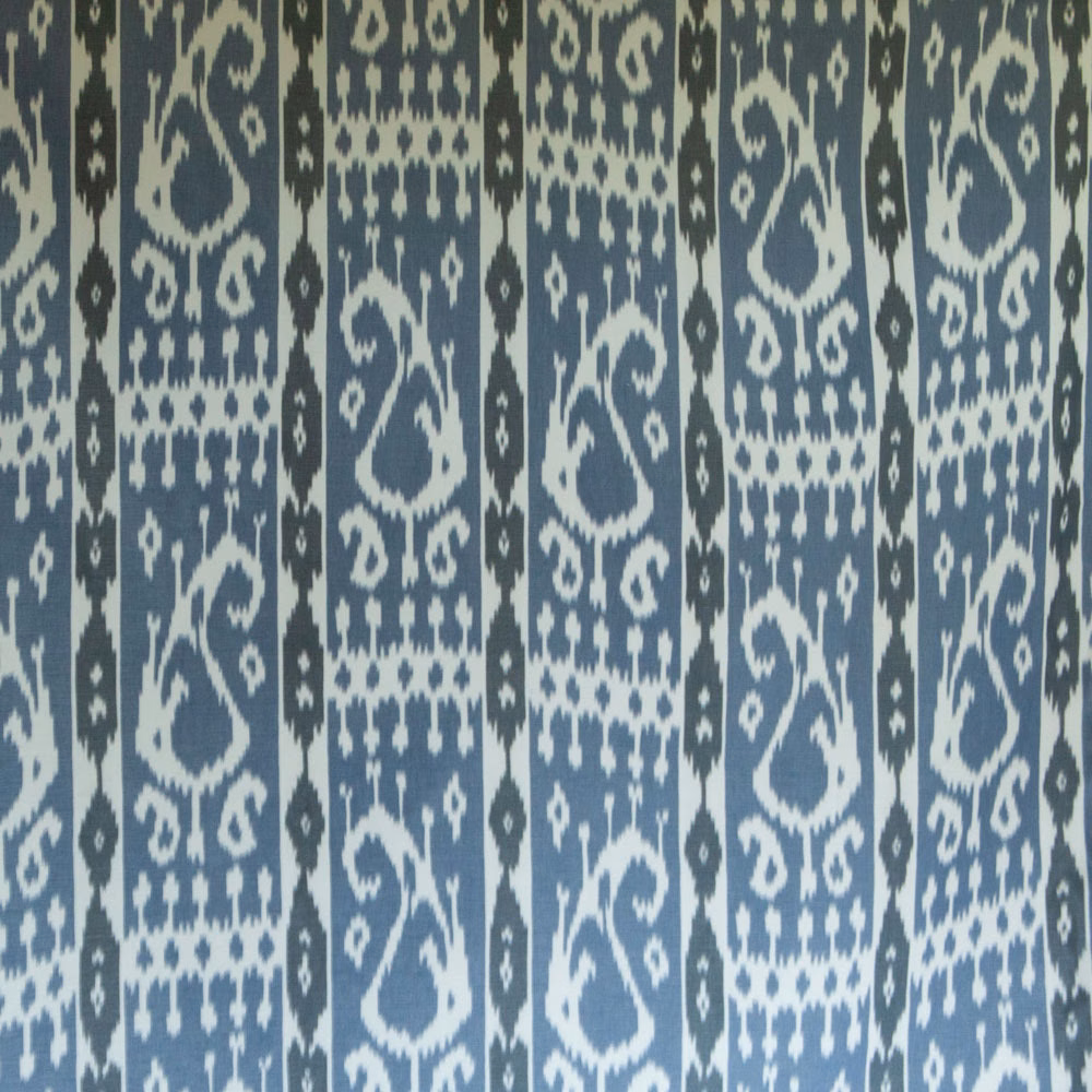 Blue paisley print with ivory motifs on a vertical striped ground