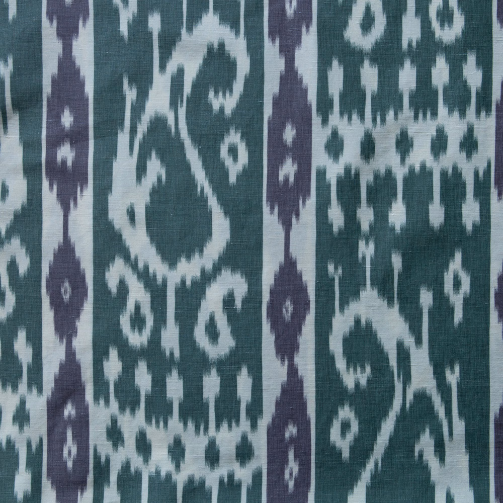 Sage green woven fabric with aubergine vertical motifs and paisley-style pattern