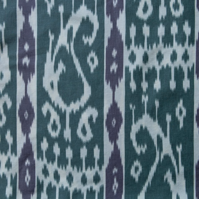 Sage green woven fabric with aubergine vertical motifs and paisley-style pattern