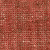 Close-up of a muted rose-red woven fabric with a small nubby texture