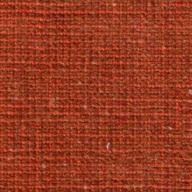 Close-up of warm terracotta woven fabric with fine textured basket weave