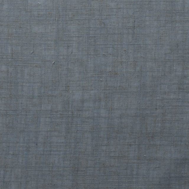 Muted azure blue woven fabric with subtle slubbed texture and tonal variation