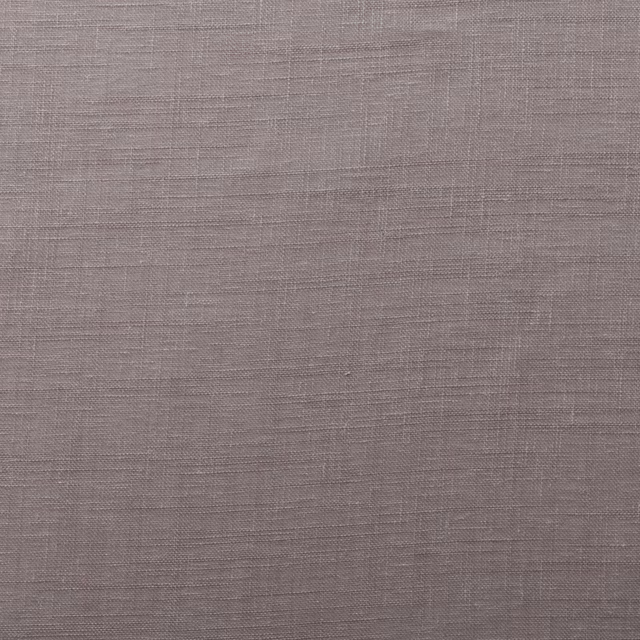 Close-up of soft dove taupe plain woven fabric with fine natural slubbing