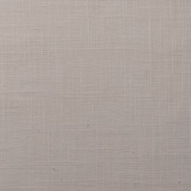 Pale limestone beige woven fabric with fine crosshatch texture and subtle slubs