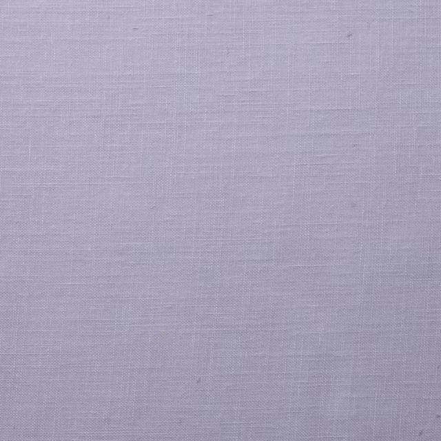 Pale lavender-grey woven fabric with a fine linen-like texture