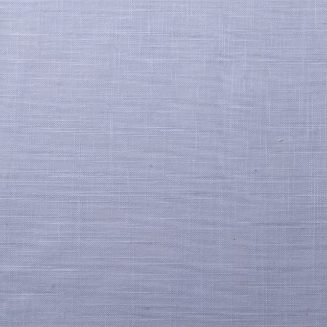 Pale sky blue woven fabric with a subtle plain texture