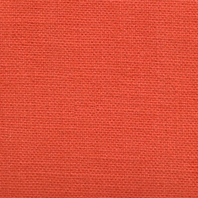 Close-up of bright cerise woven fabric with a tight plain texture