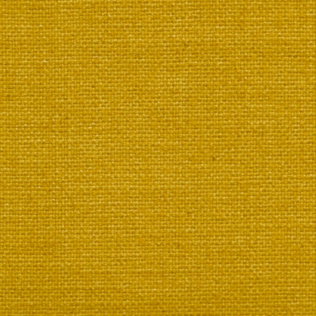 Close-up of a golden yellow woven fabric with fine plain texture