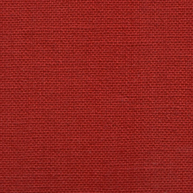 Close-up of deep magenta woven fabric with a fine textured plain weave
