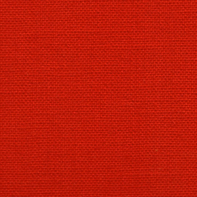 Close-up of a bright red plain woven fabric with a fine, even texture.
