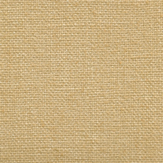Close-up of a warm sandy beige plain woven fabric with fine texture