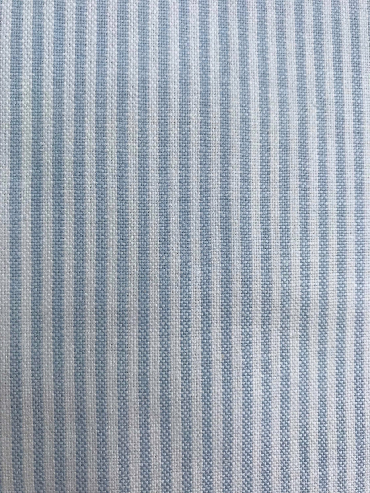 Soft aqua and pale grey-blue vertical striped woven fabric swatch