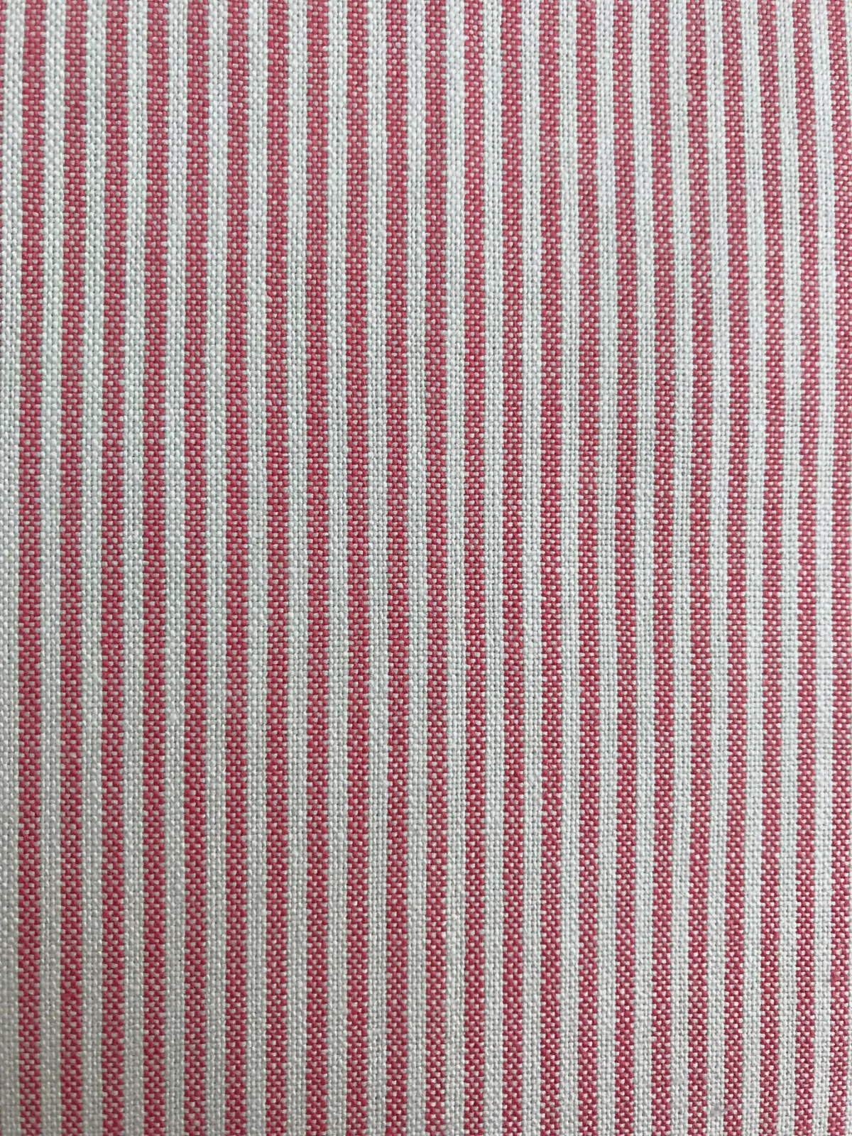 Vertical narrow raspberry pink stripe woven on a pale grey-white ground