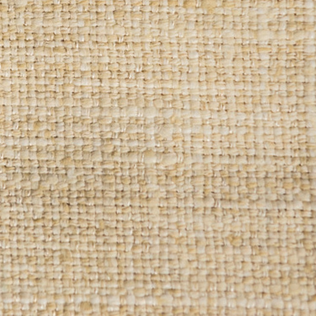 Close-up of warm beige woven fabric with a nubby textured weave