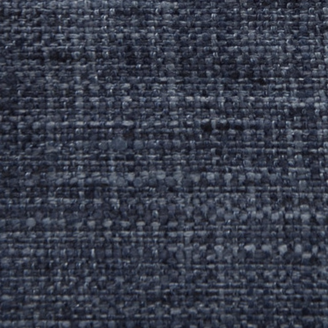 Close-up of deep Prussian blue woven fabric with compact textured weave