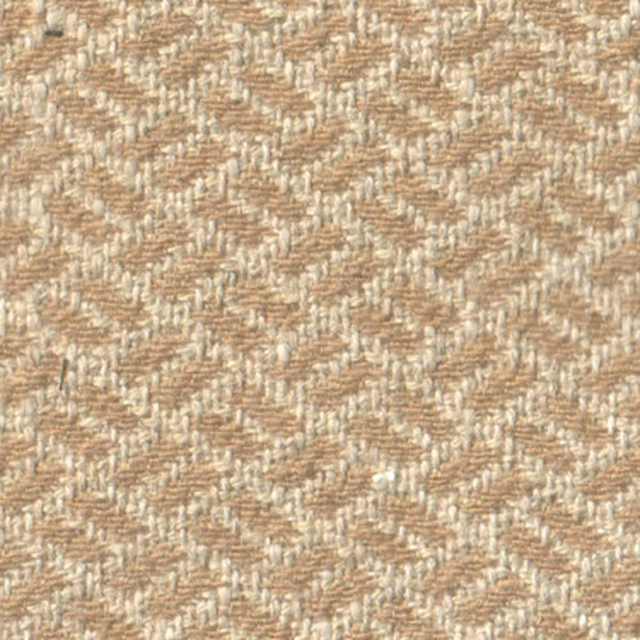 Close-up of warm biscuit beige woven fabric with small geometric pattern
