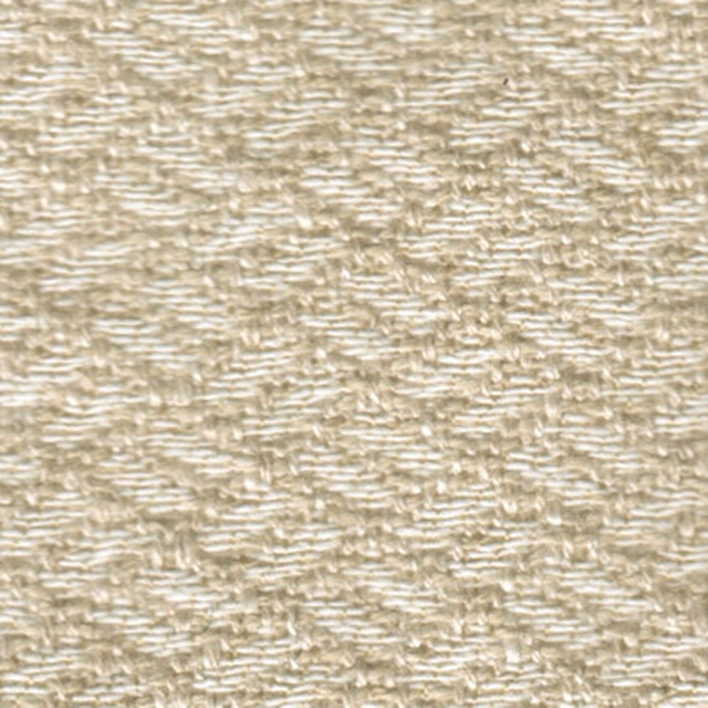 Close-up of warm ecru woven fabric with fine textured slub