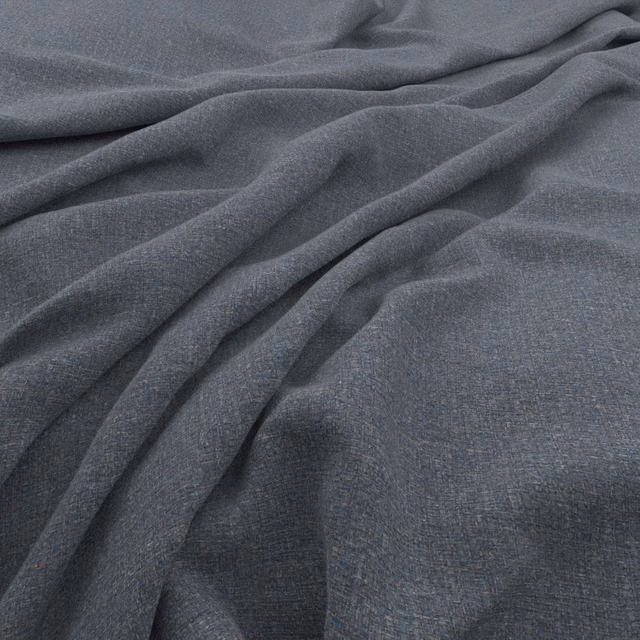 Cool blue-grey woven fabric gathered into soft, low-sheen folds