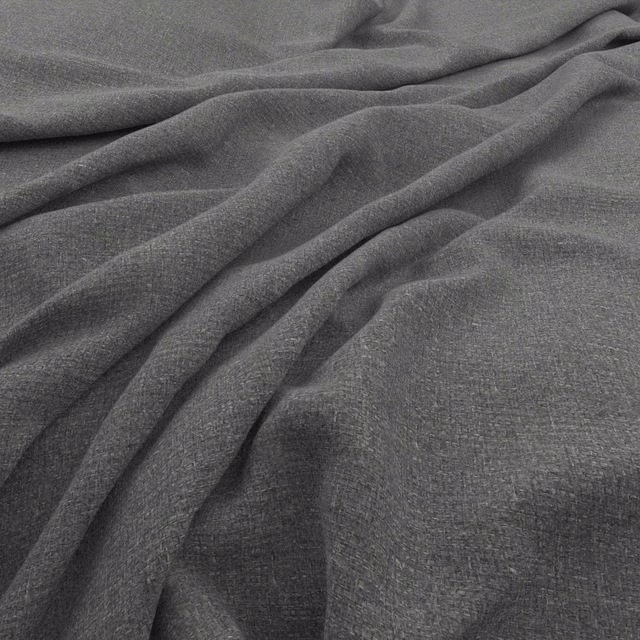 Deep charcoal-grey woven fabric showing fine texture and soft flowing folds