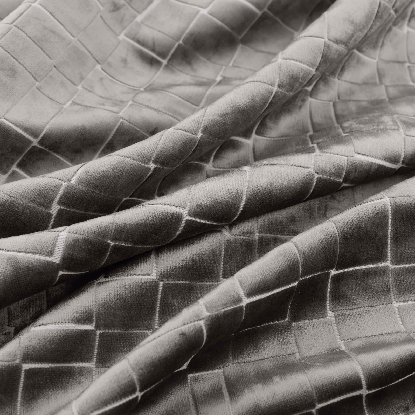 Cool nickel-grey quilted grid textile with silvery sheen across folded fabric