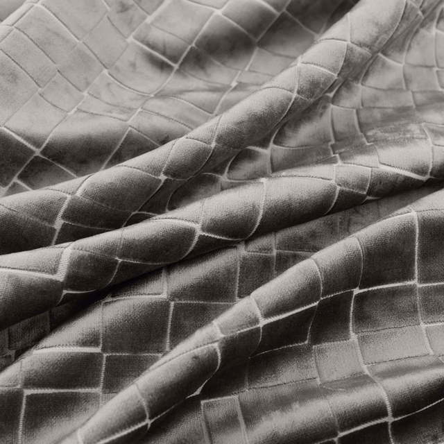Cool nickel-grey quilted grid textile with silvery sheen across folded fabric