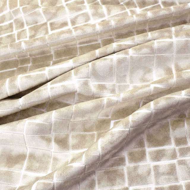 Oyster fabric with softly lustrous rectangular grid and folded, textured surface